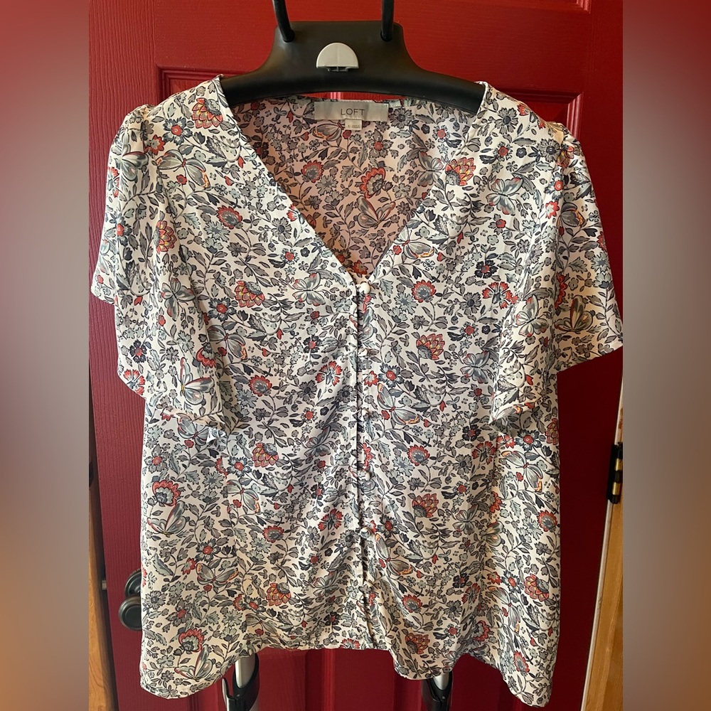 Women’s floral blouse with flare sleeve